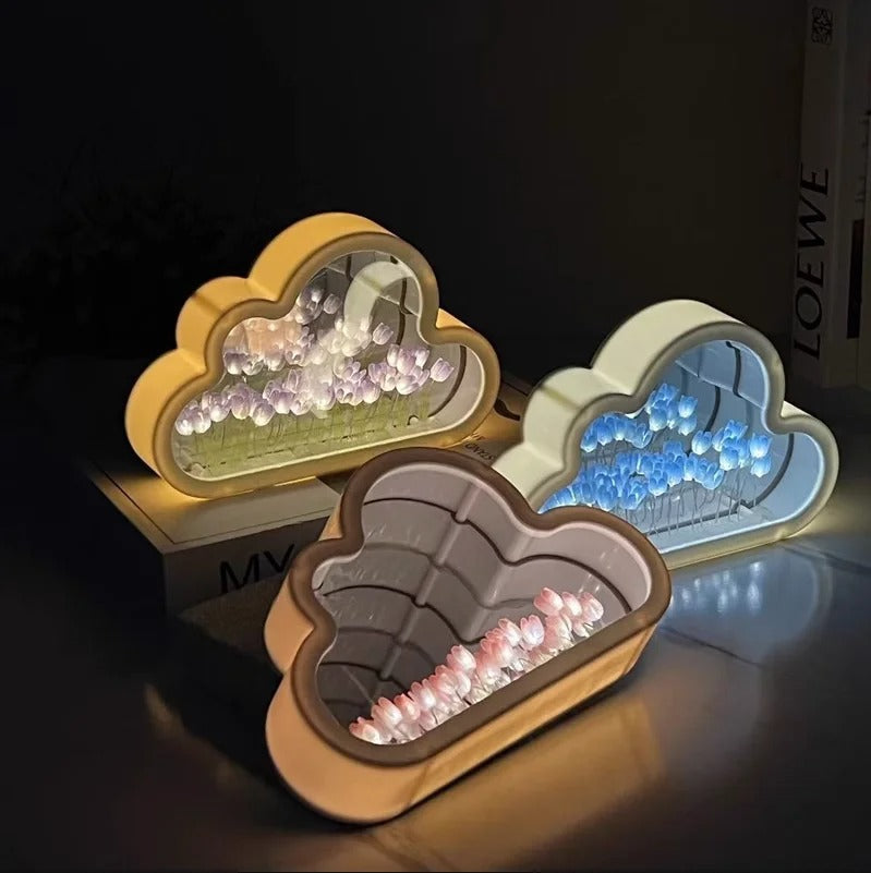 Three cloud-shaped tulip mirrors displayed together